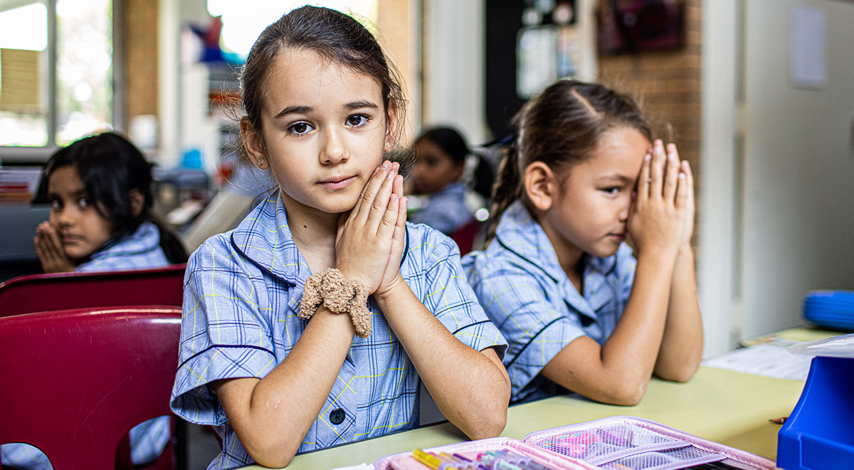 Students praying at Our Lady of the Rosary Catholic Primary School St Marys