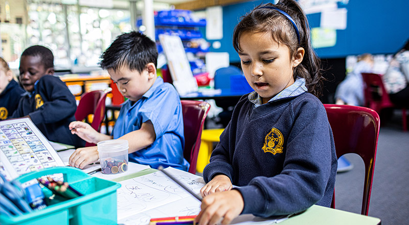 Students at desk at Our Lady of the Rosary Catholic Primary School St Marys