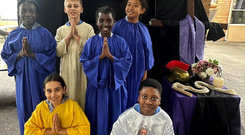 Students performing liturgical movement at Our Lady of the Rosary Catholic Primary School St Marys