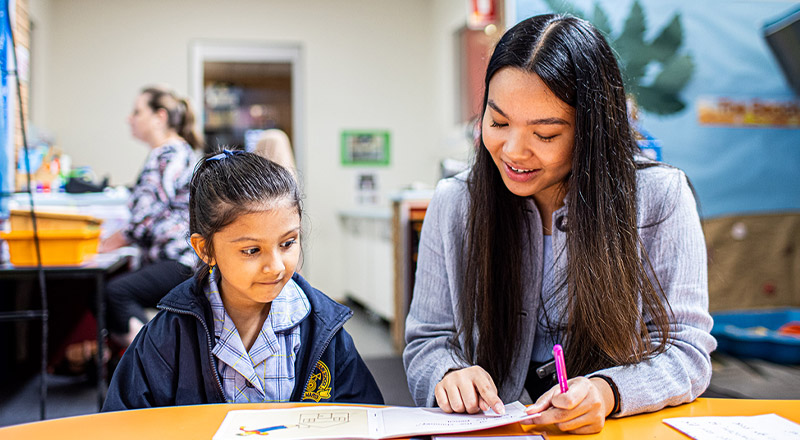 Dedicated teacher and student from Our Lady of the Rosary Catholic Primary School St Marys