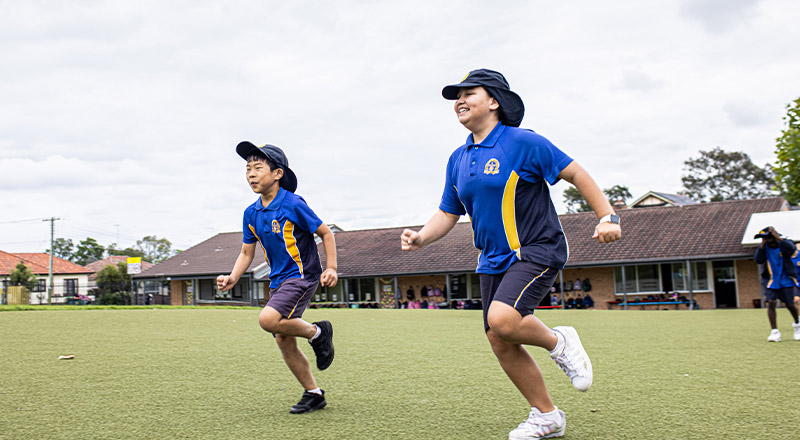 Children running at Our Lady of the Rosary Catholic Primary School St Marys