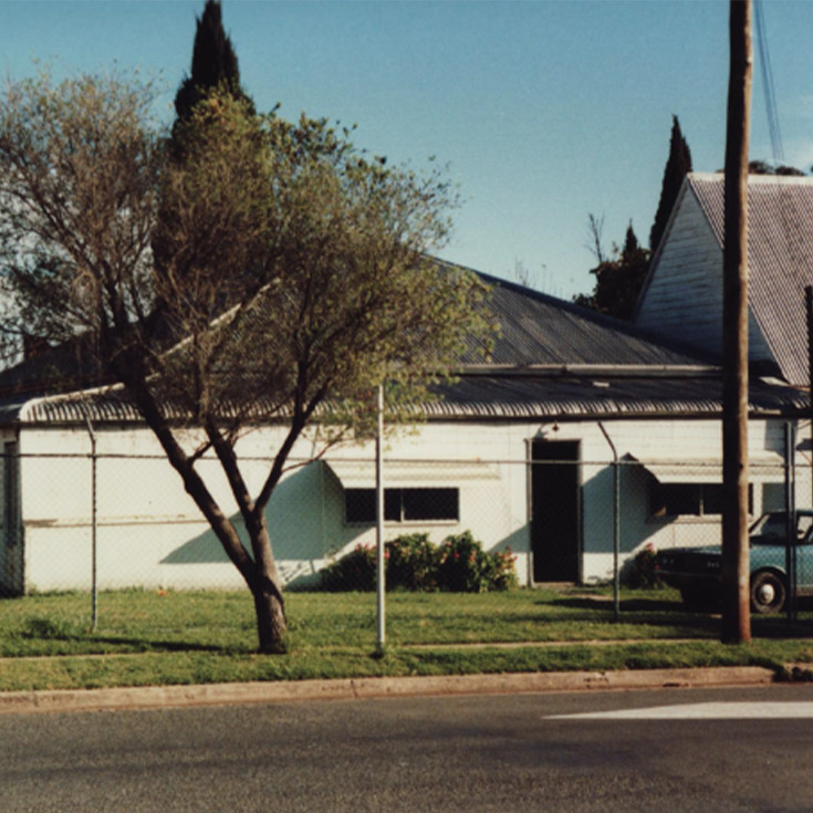 Old photo of an original building from the early days of Our Lady of the Rosary Catholic Primary School St Marys