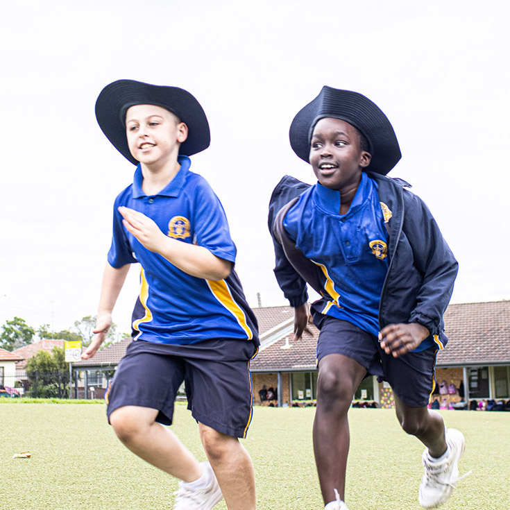 Students running at Our Lady of the Rosary Catholic Primary School St Marys